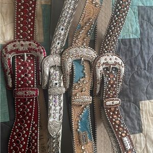 3 BB Simon belts. All in great condition. Tan & turquoise; red; brown acid wash.